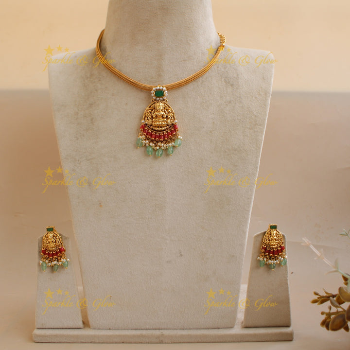 Beautiful Lakshmi peacock carved pendant Chain with coral emerald and mint green beads