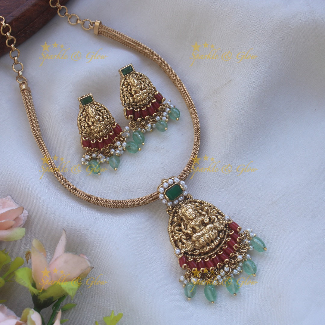 Beautiful Lakshmi peacock carved pendant Chain with coral emerald and mint green beads