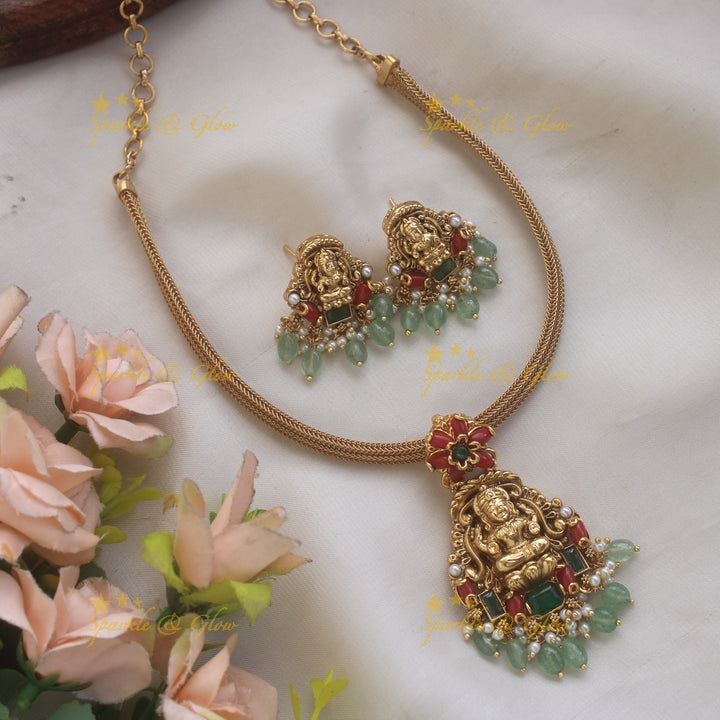 Elegant Lakshmi floral design pendant Chain with coral emerald and mint green beads