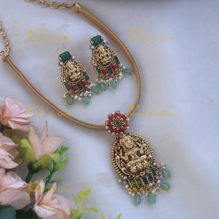 Gold alike Lakshmi floral design pendant Chain with coral emerald and mint green beads