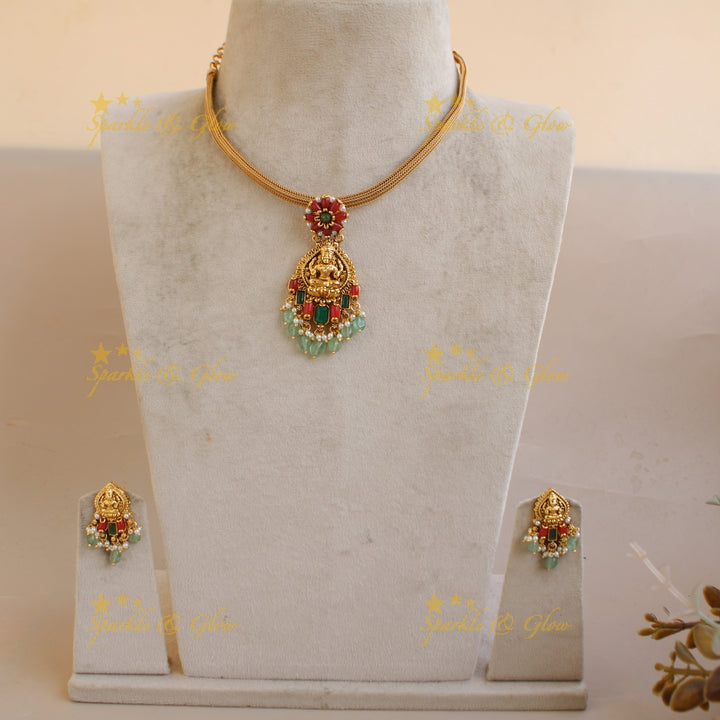 Statement Lakshmi floral design pendant Chain with coral emerald and mint green beads
