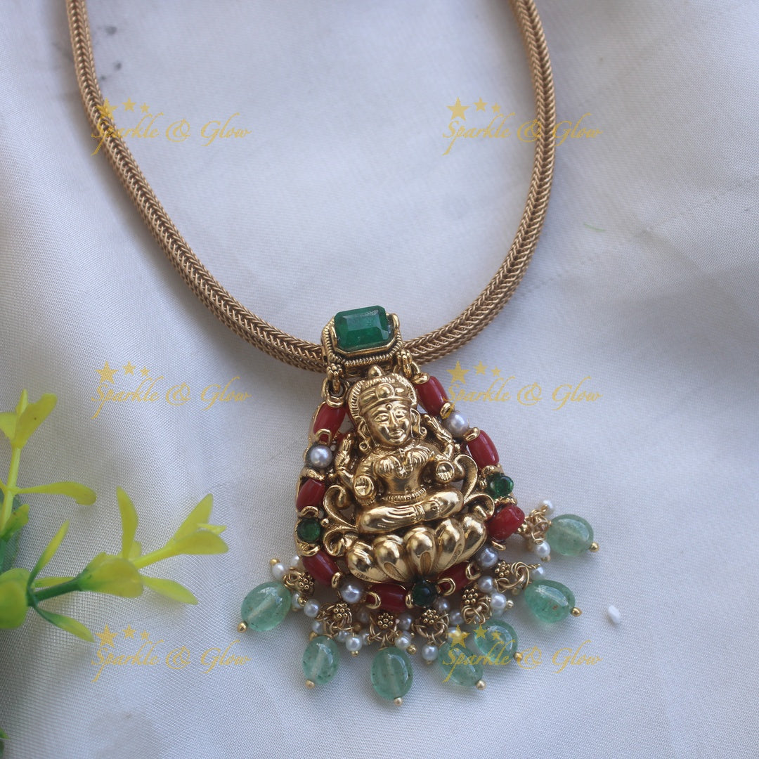 Beautiful Lakshmi carved pendant Chain with coral emerald and mint green beads