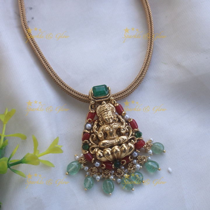 Beautiful Lakshmi carved pendant Chain with coral emerald and mint green beads