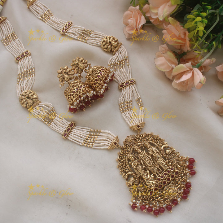 Gorgeous Rama Parivar carved pendant haram with ruby and multi layer pearl chain and red beads