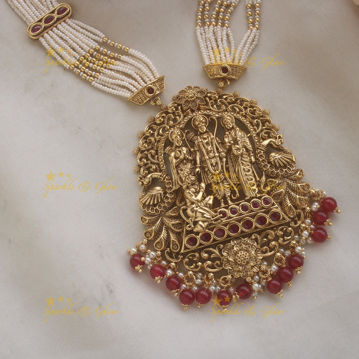 Gorgeous Rama Parivar carved pendant haram with ruby and multi layer pearl chain and red beads