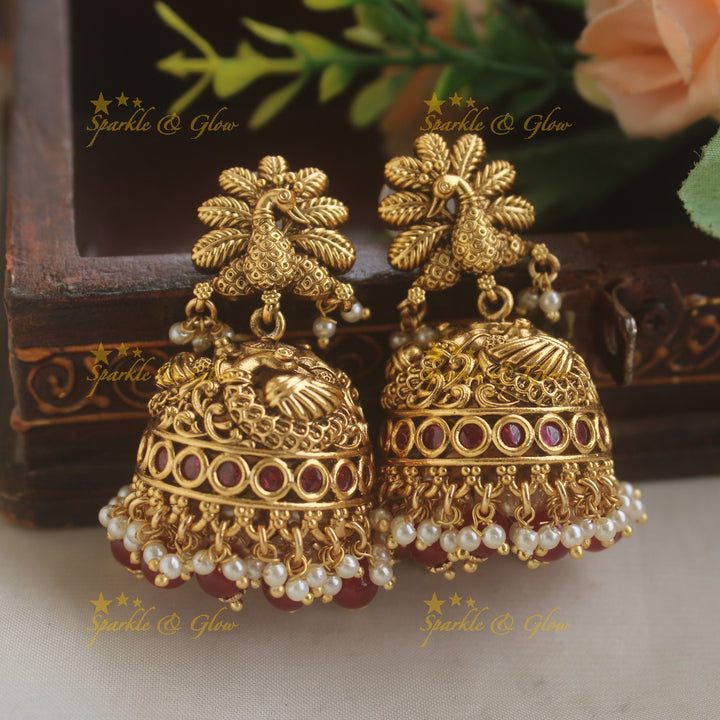 Gorgeous Rama Parivar carved pendant haram with ruby and multi layer pearl chain and red beads