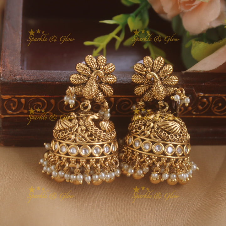 Gorgeous Ram Parivar carved pendant haram with ruby and multi layer pearl chain and gold beads