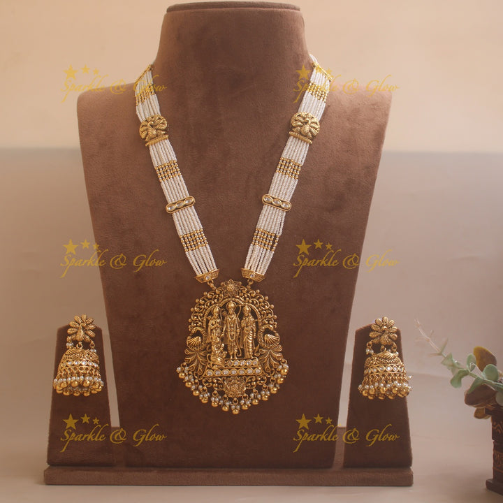 Gorgeous Ram Parivar carved pendant haram with ruby and multi layer pearl chain and gold beads