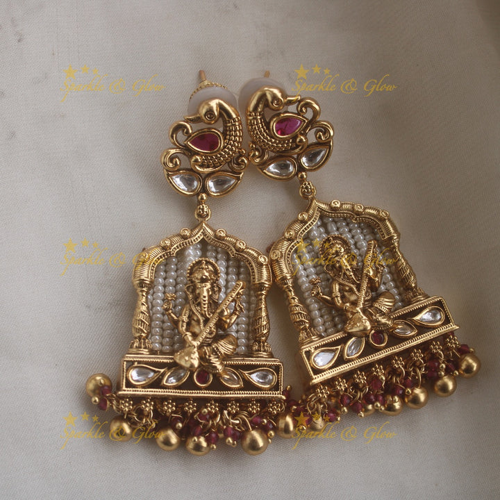 Exclusive Ganesha carved pendant haram with kundan stones and multi layer pearl and pink beads chain