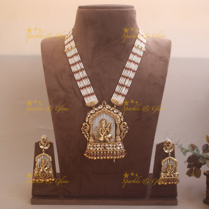 Exclusive Ganesha carved pendant haram with kundan stones and multi layer pearl and pink beads chain
