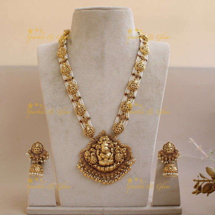 Idol Lakshmi Peacock carved pendant haram with Multi layered Pearl chain