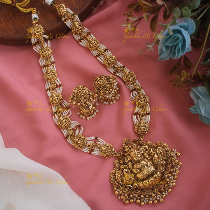 Idol Lakshmi Peacock carved pendant haram with Multi layered Pearl chain