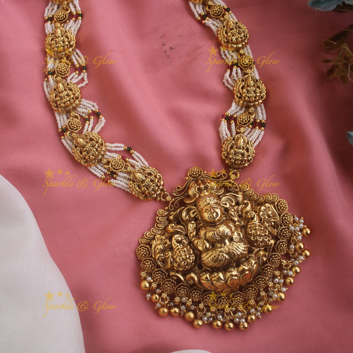 Idol Lakshmi Peacock carved pendant haram with Multi layered Pearl chain