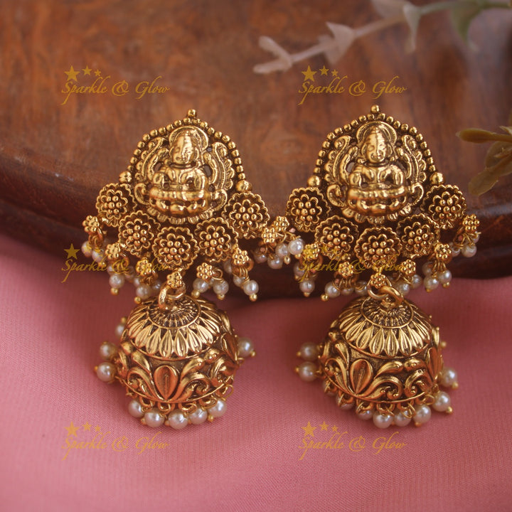 Idol Lakshmi Peacock carved pendant haram with Multi layered Pearl chain