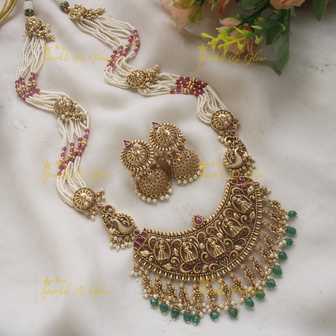 Gorgeous Bridal Procession carved pendant haram with multi layered pearl chain with gold beads