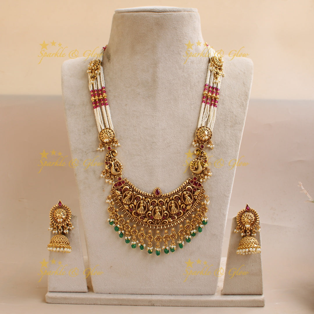 Gorgeous Bridal Procession carved pendant haram with multi layered Rubypearl chain with green beads