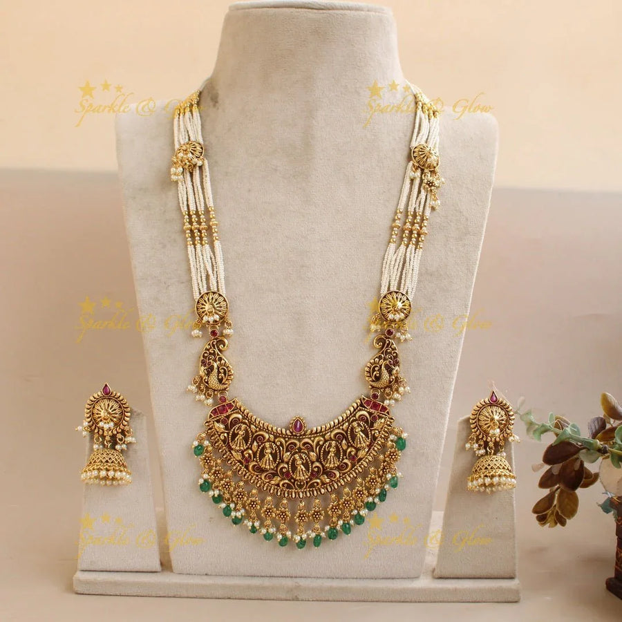 Gorgeous Bridal Procession carved pendant haram with multi layered pearl chain with green beads - Sparkle and Glow
