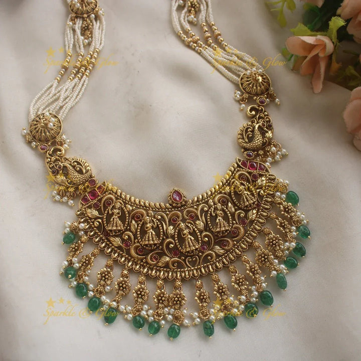 Gorgeous Bridal Procession carved pendant haram with multi layered pearl chain with green beads - Sparkle and Glow