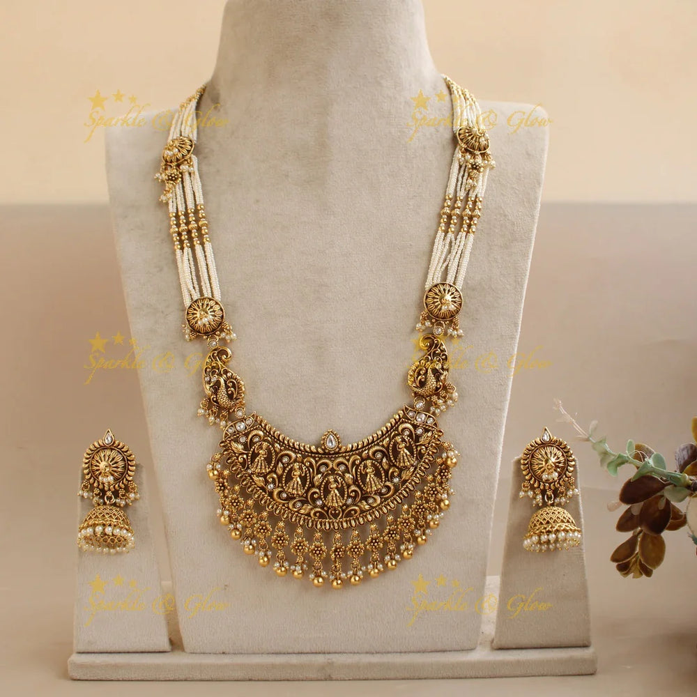 Gorgeous Bridal Procession carved pendant haram with multi layered Rubypearl chain with green beads - Sparkle and Glow