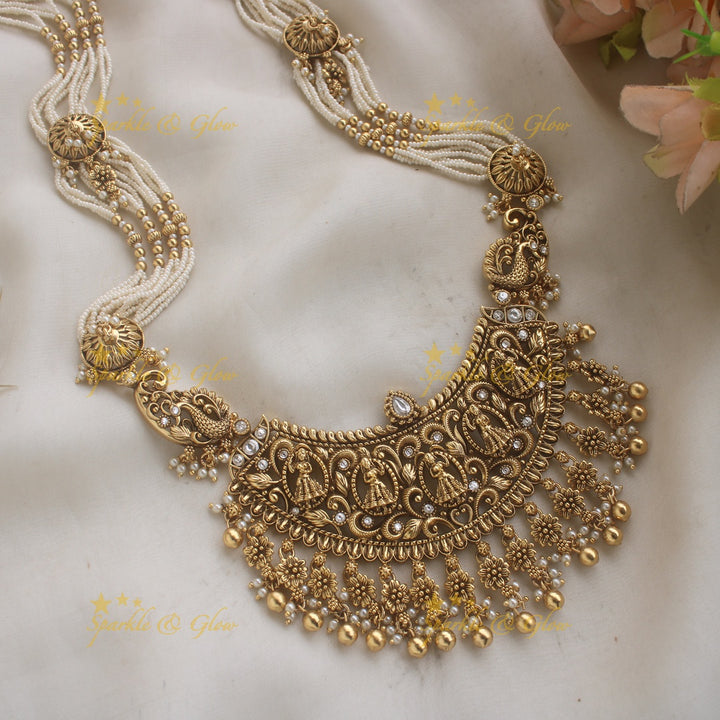 Gorgeous Bridal Procession carved pendant haram with multi layered pearl chain with gold beads