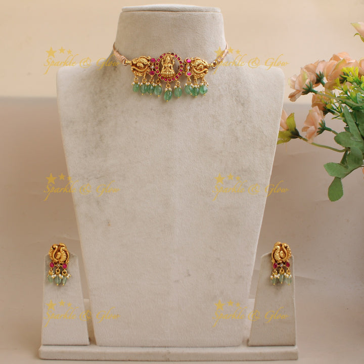 Stunning Lakshmi Peacock Carved Jadau Choker with Mint green beads
