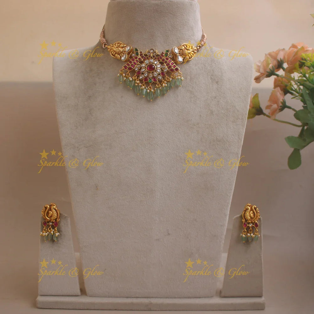 Intricately Carved Dual Tone Peacock Floral Jadau Choker with Mint green beads - Sparkle and Glow