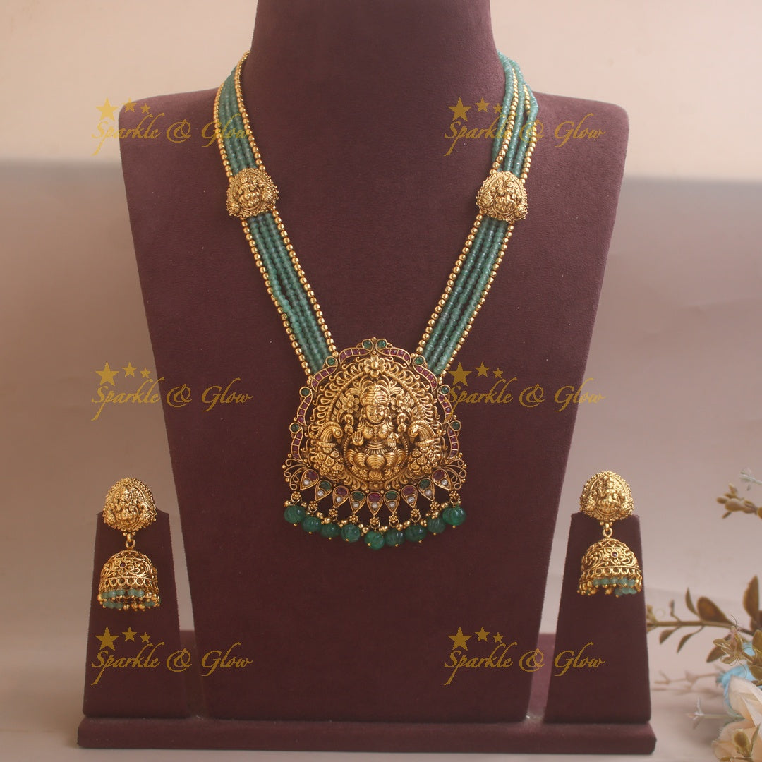 Stunning Lakshmi Peacock carved pendant haram with multi layered Mintgreen and Gold beads chain