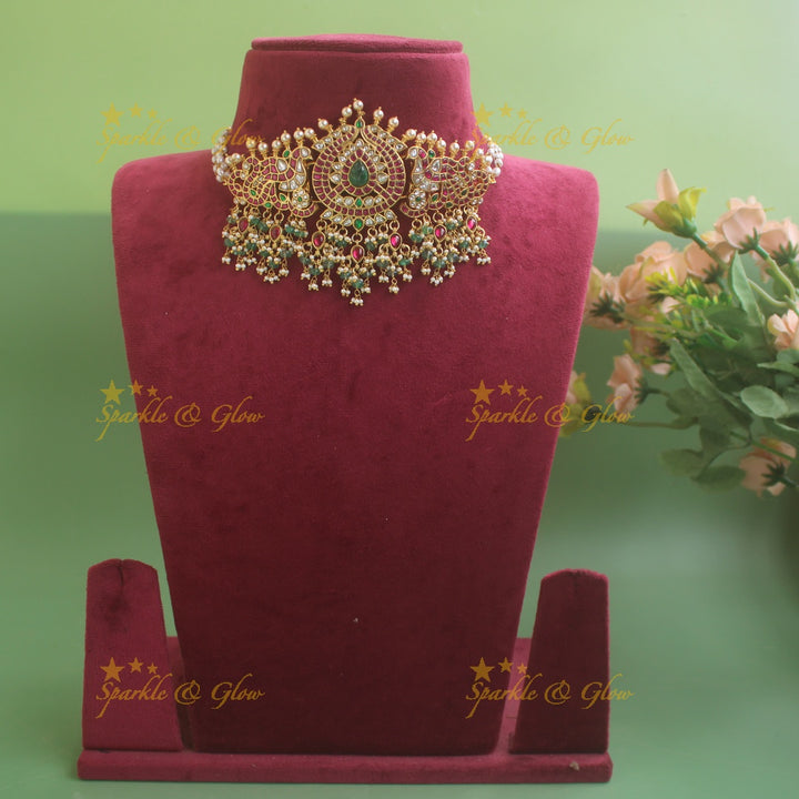Beautiful Peacock Floral and leaf design jadau choker with pearls and mint green beads