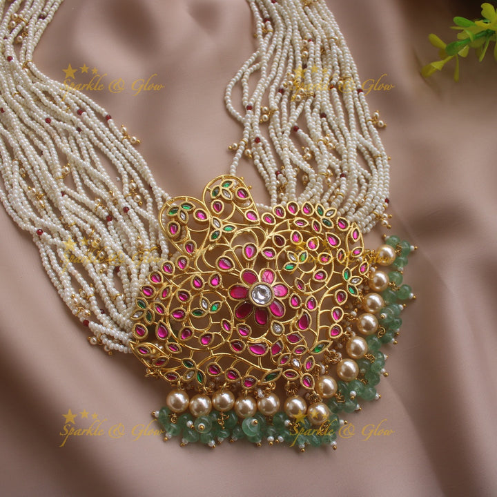 Grand intricate Floral leflet jadau pandent haram with multi layer pearl gold beads chain and mint green beads