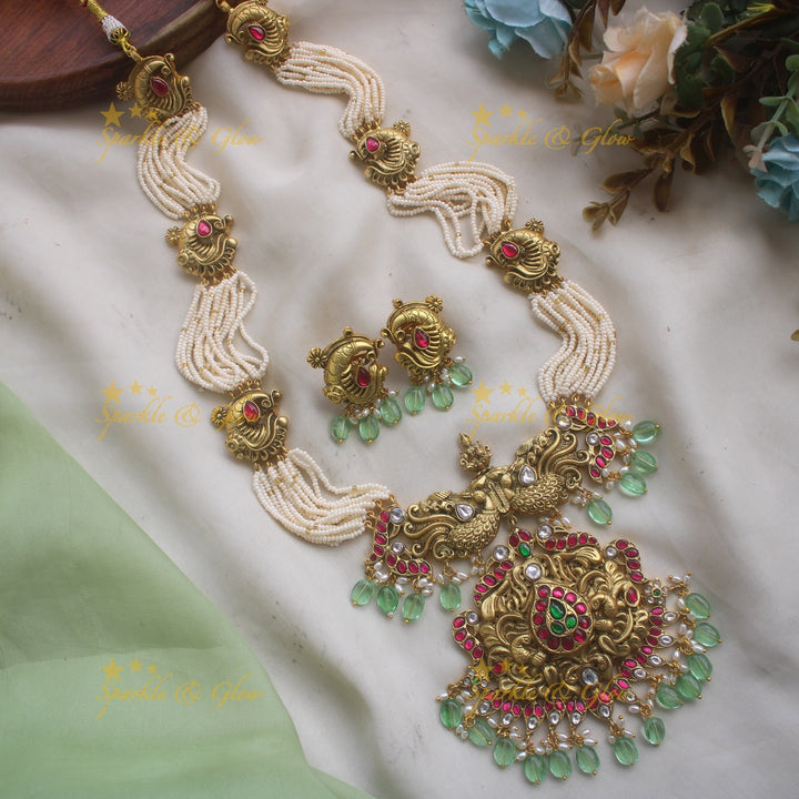 Grand Intricate Peacock carved jadau haram with multi layer pearl chain and mint green beads