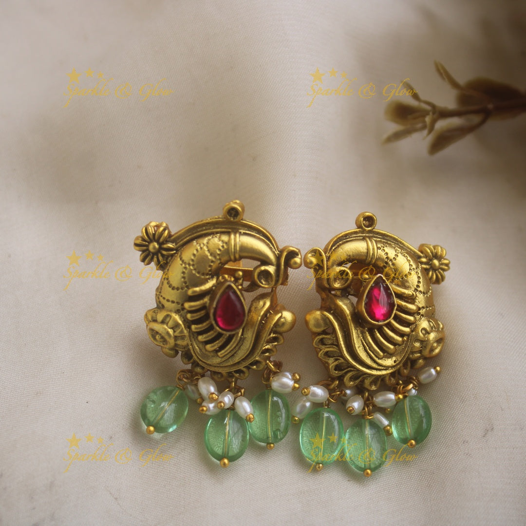 Grand Intricate Peacock carved jadau haram with multi layer pearl chain and mint green beads