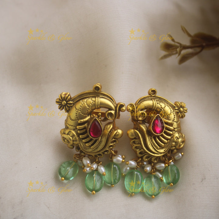 Grand Intricate Peacock carved jadau haram with multi layer pearl chain and mint green beads