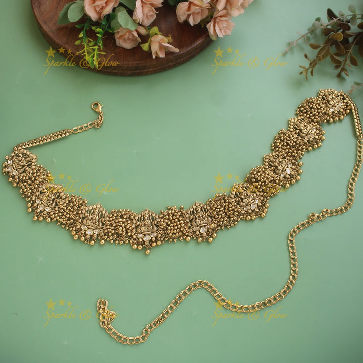 Beautiful Lakshmi carved hipchain with cluster gold beads