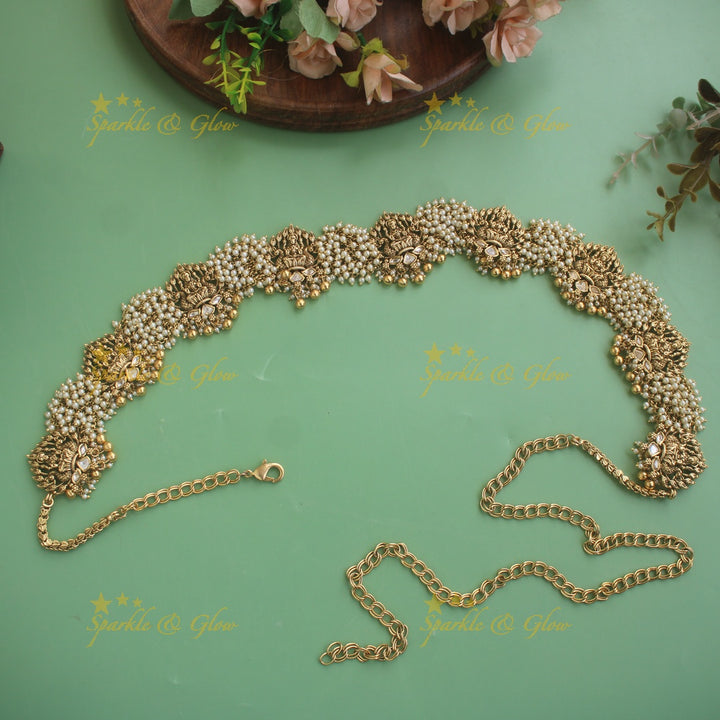 Beautiful Lakshmi carved hipchain with cluster gold beads