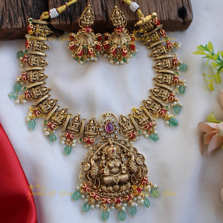 Stunning Idol Lakshmi Peacock Floral carved Short necklace with Coral and Mintgreen beads