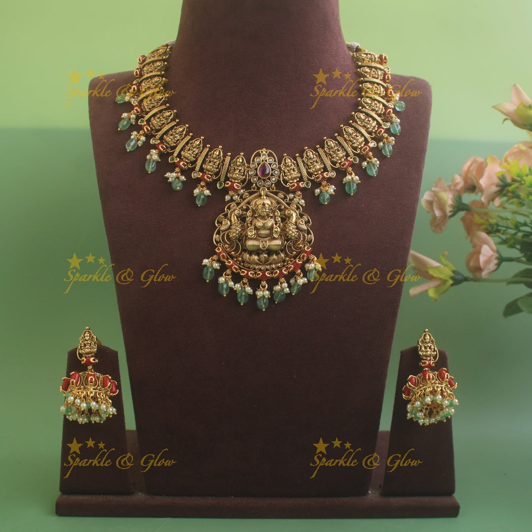 Stunning Idol Lakshmi Peacock Floral carved Short necklace with Coral and Mintgreen beads