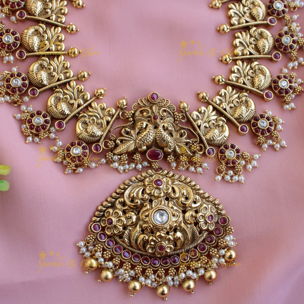 Sparkling Kemp Peacock Floral bottu design short necklace with gold beads and pearls - Sparkle and Glow