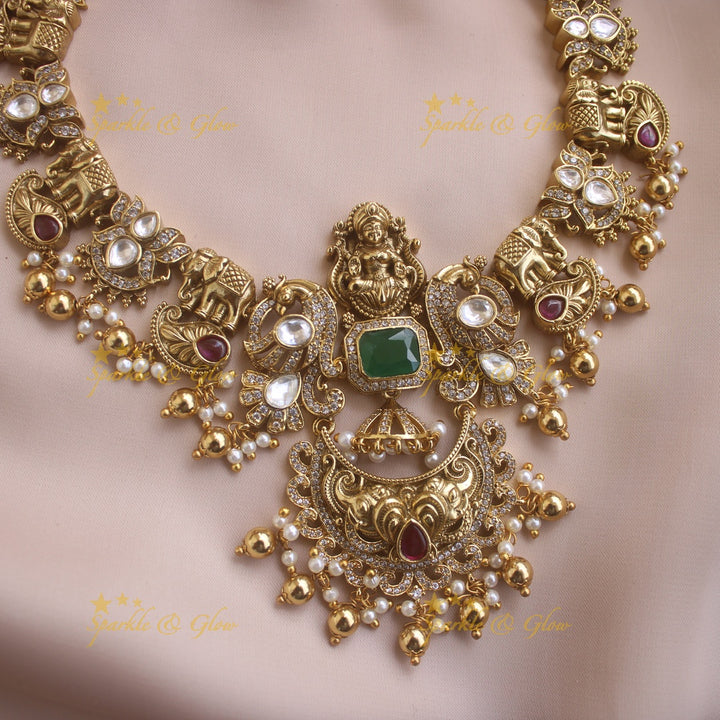 Intricately carved Idol Lakshmi Elephant Peacock Short necklace with Chandbali Earrings
