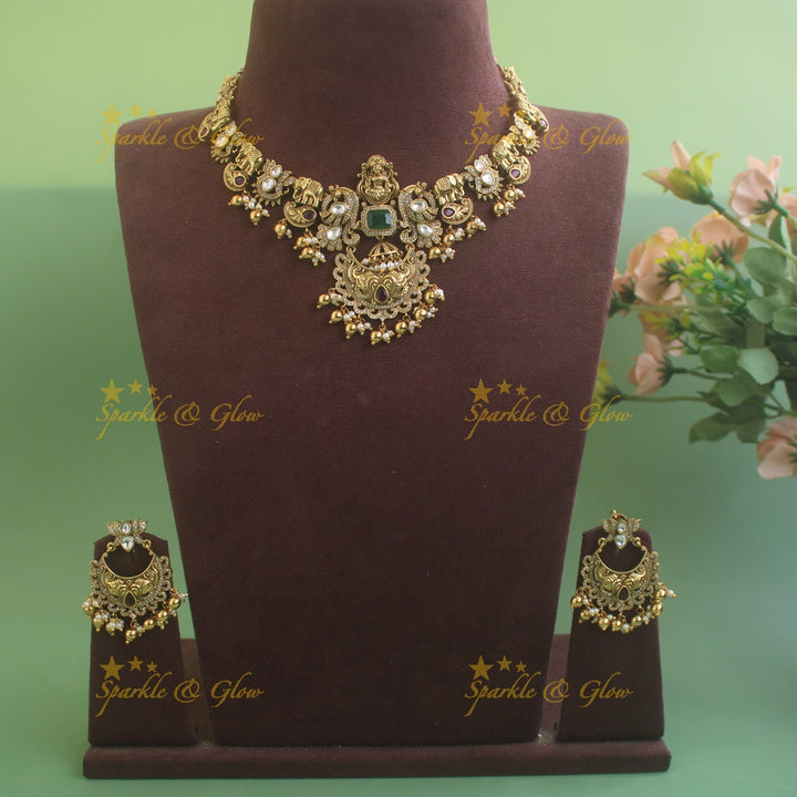 Intricately carved Idol Lakshmi Elephant Peacock Short necklace with Chandbali Earrings