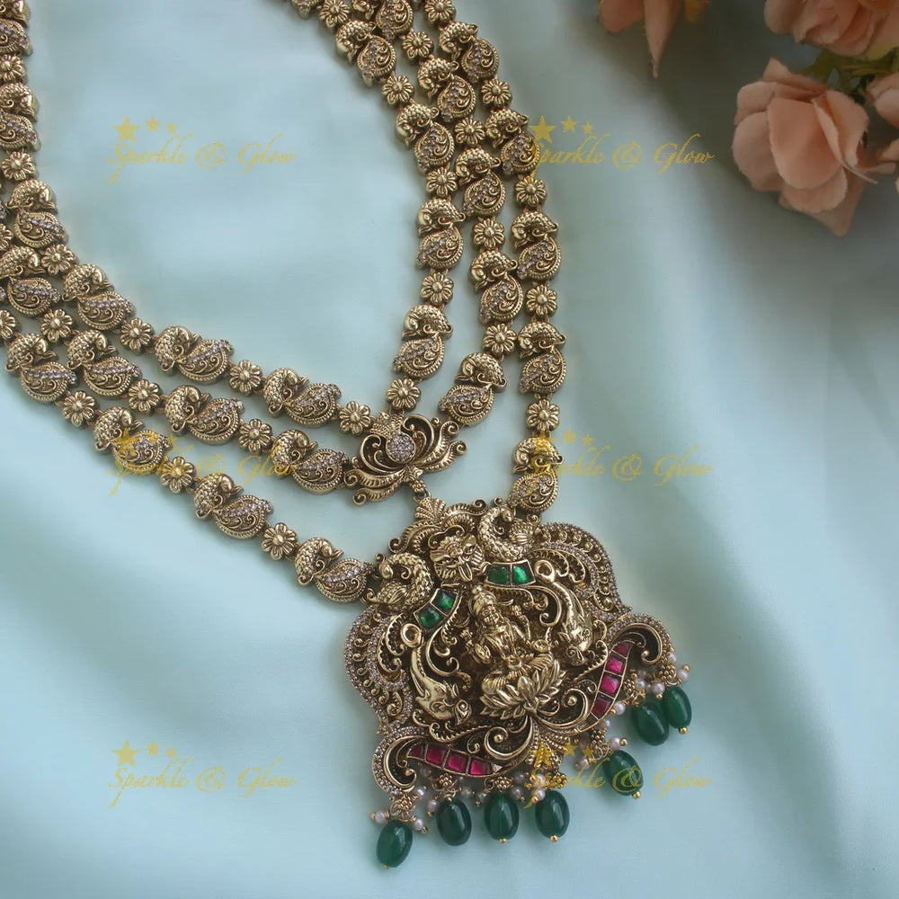 Grand Lakshmi Peacock pendant carved Three Layered Haram - Sparkle and Glow
