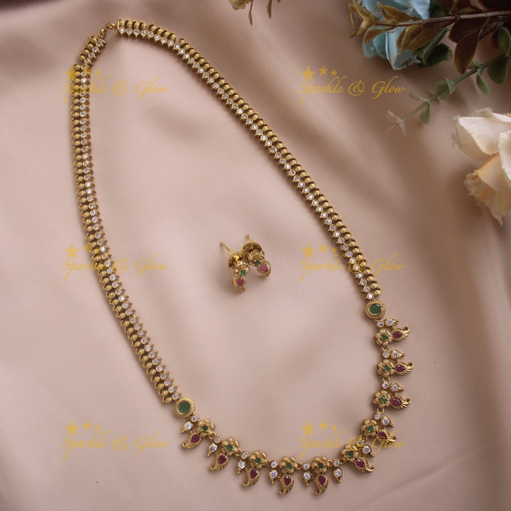 Gold Alike Floral mango design short necklace with CZ stones ruby and emerald