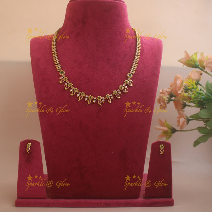 Gold Alike Floral mango design short necklace with CZ stones ruby and emerald