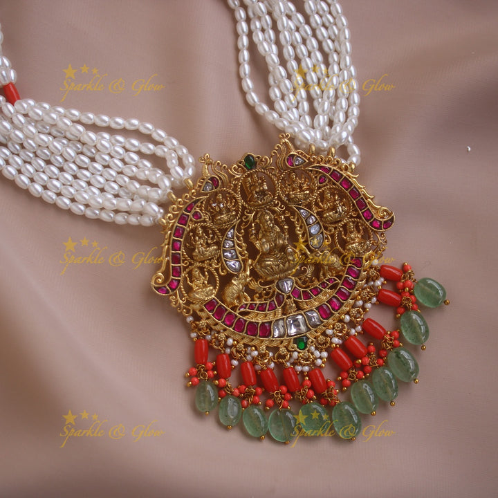 Exquisite Lakshmi Elephant Peacock carved pendant haram with coral multi layer pearl chain and mint green beads