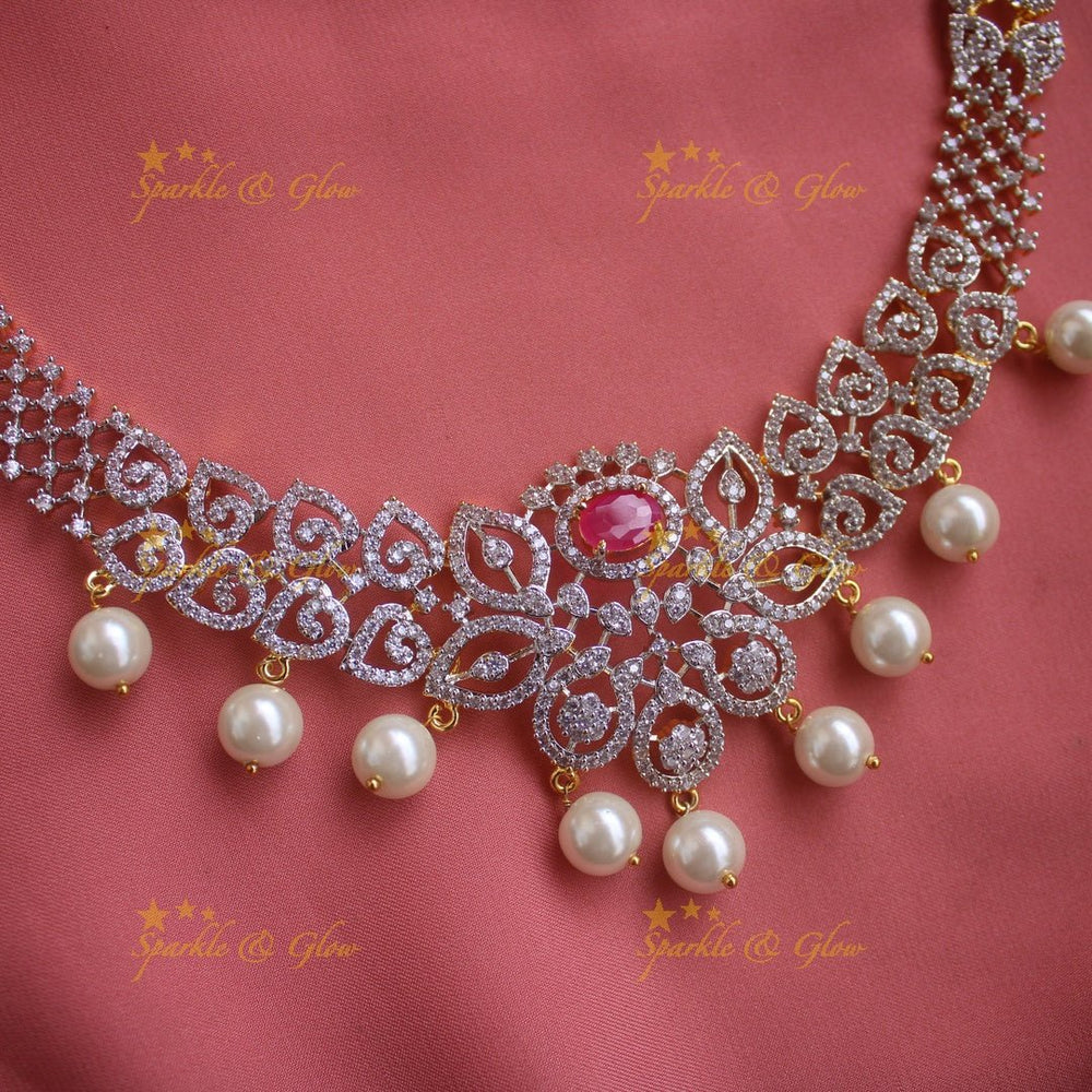 Elegant Floral Leaflet design American diamond short necklace with ruby and pearl drops with maang tikka - pink - Sparkle and Glow - Back Thread - 