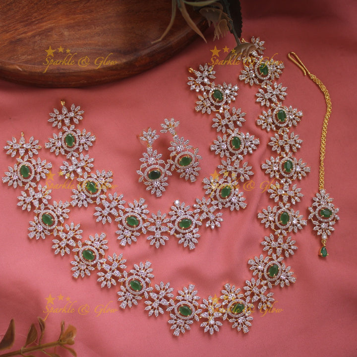 Exclusive Floral design American diamond necklace set  with emerald stones with maang tikka - green