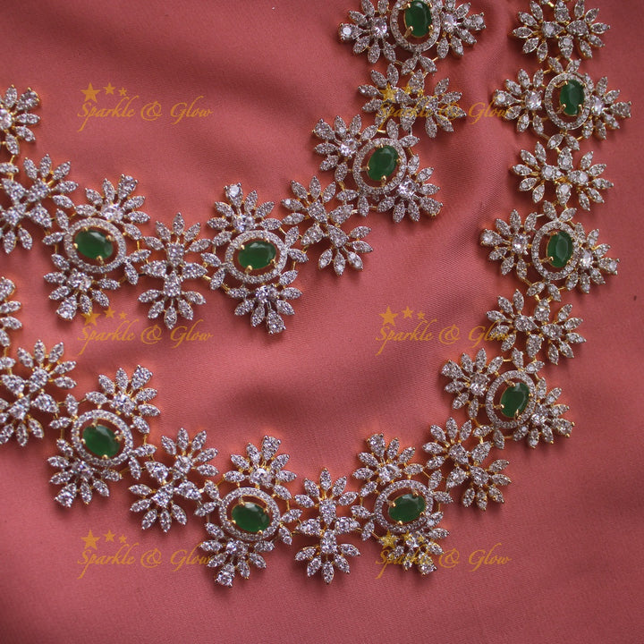 Exclusive Floral design American diamond necklace set  with emerald stones with maang tikka - green