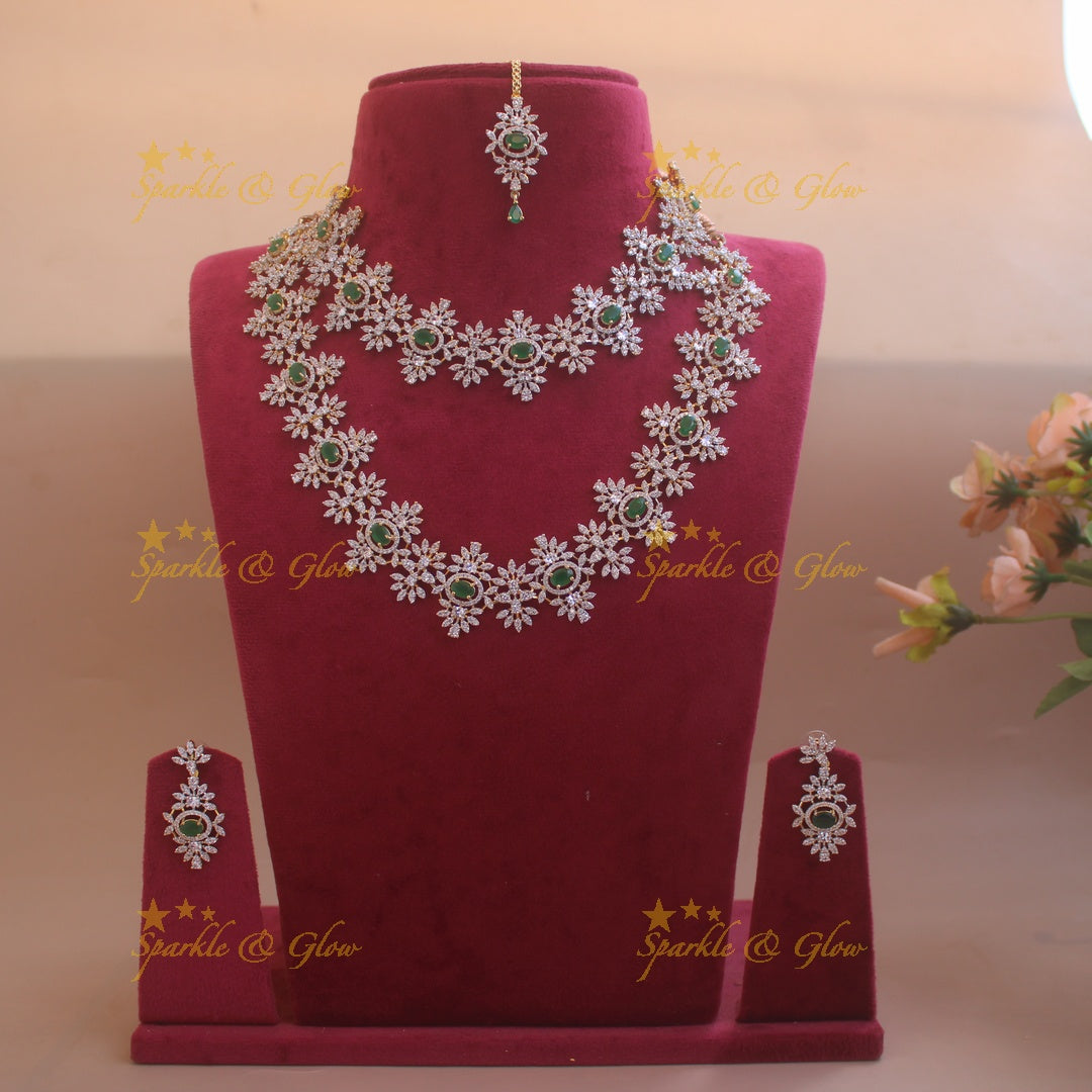 Exclusive Floral design American diamond necklace set  with emerald stones with maang tikka - green