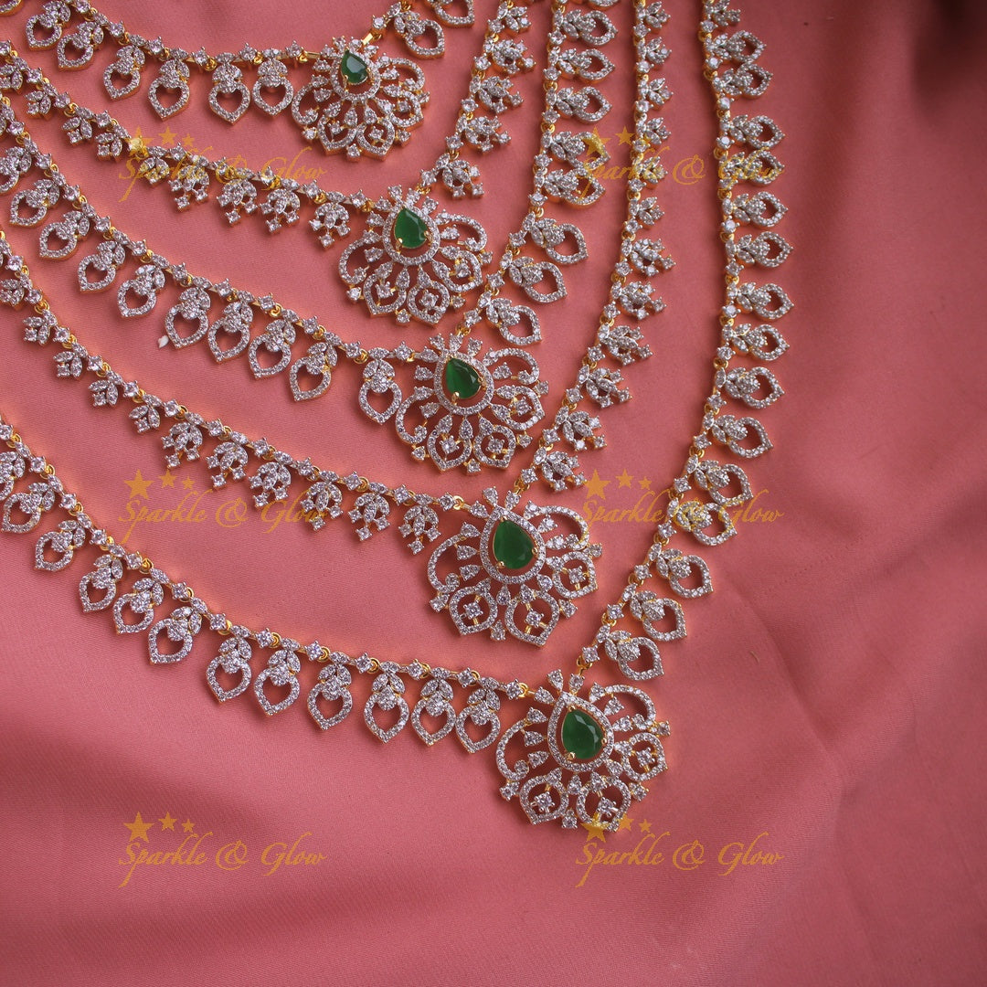 Sparkling Floral leaf design American diamond multi layer haram with emerald stones - green