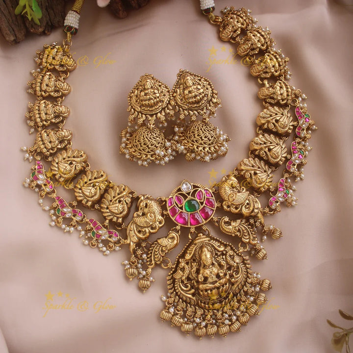Elegant Lakshmi peacock carved jadau short necklace with pearls and gold beads - pink - Sparkle and Glow