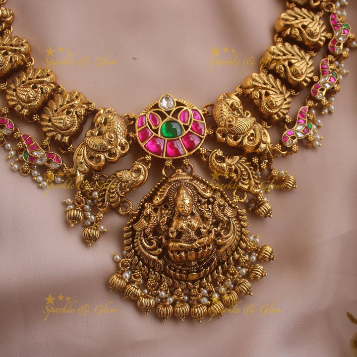 Elegant Lakshmi peacock carved jadau short necklace with pearls and gold beads - pink - Sparkle and Glow